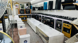 modern sanitary wares and bathroom fixtures, including toilets, sink, shower panels, and decorative mirrors