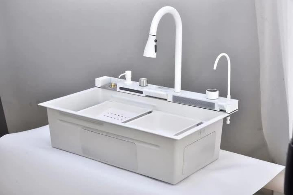 Multifunctional, white stainless steelworkstation kitchen sink featuring a digital temperature display
