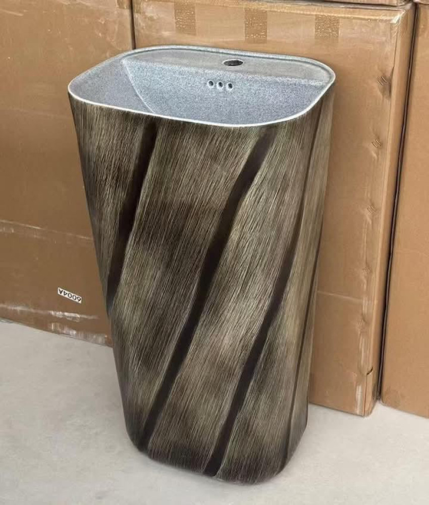 Free-standing, One-piece pedestal wash basin