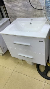 Bathroom Vanity unit featuring a fluted design and a countertop basin