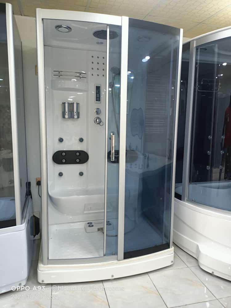 Multi-functional steam shower cabin featuring body massage jets and integrated electronics