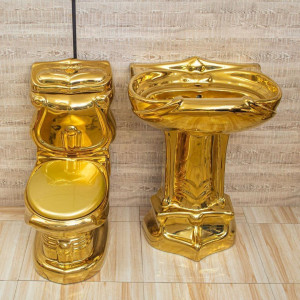 gold-plated luxury bathroom set typically includes water closet and matching basin