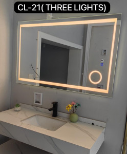 decorated wall-mounted round LED mirror featuring a gold frame and a hanging straps