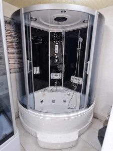 Steam shower cabin with a built-in jacuzzi whirlpool tub