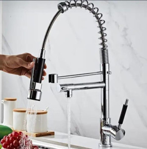 commercial-style Kitchen faucet with a pull-down sprayer and spring design