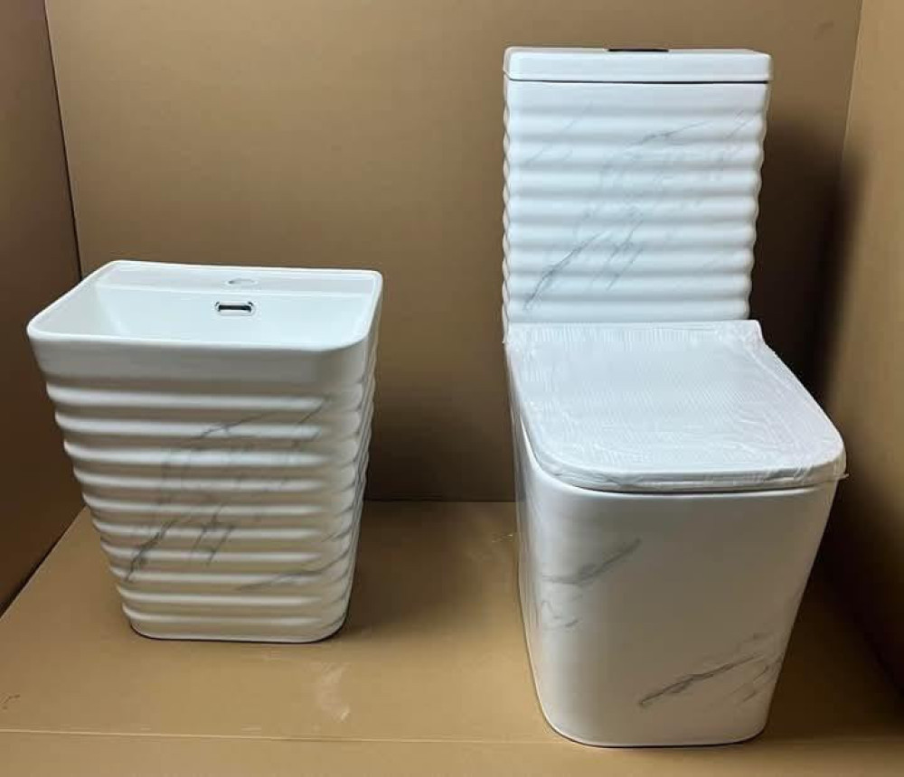 White marble-patterned, fluted executive one-piece water closet set