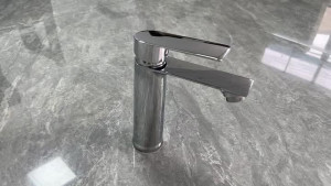 Modern chrome-finished basin mixer tap 