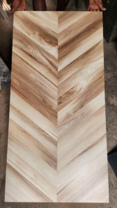 Chvron-patterned wood-look porcelain tile