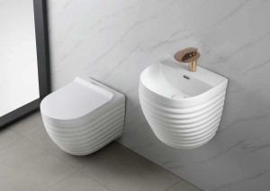 modern bathroom set features a wall-hung toilet and a matching wall-mountd basin
