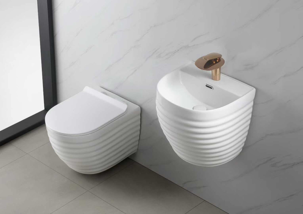 modern bathroom set features a wall-hung toilet and a matching wall-mountd basin