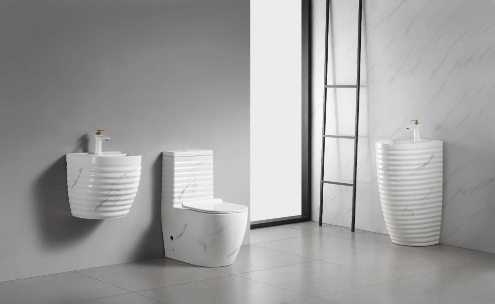 modern white ceramic bathroom set with a ribbed design and marble effect