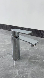 modern basin mixer tap features a sturdy stylish curved design and a polished chrome finish