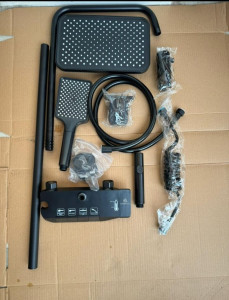 black shower system with a digital display control panel 