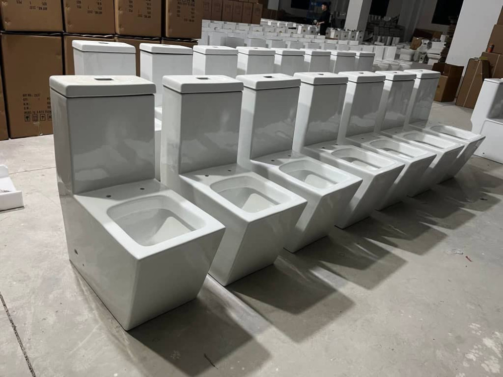 modern, square-shaped water closets, likely ceramic