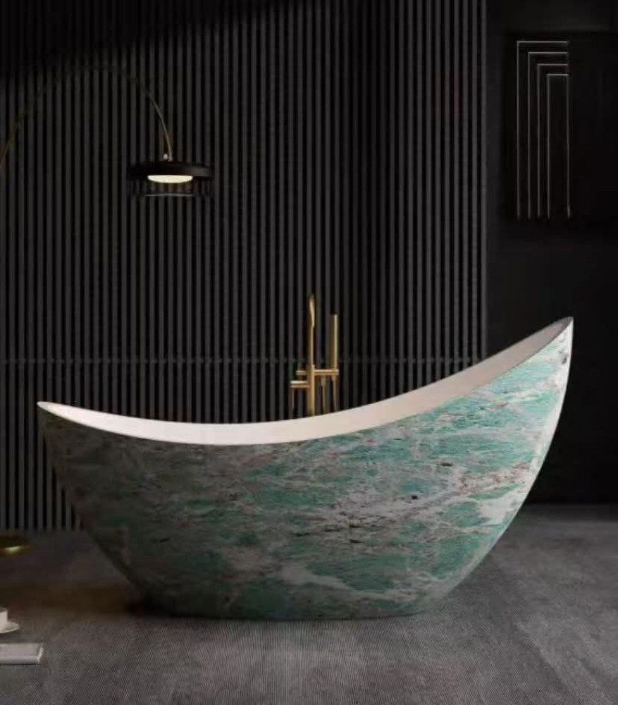 decorative freestanding bathtub featuring a curved, boat-like shape and a green marble-patterned finish