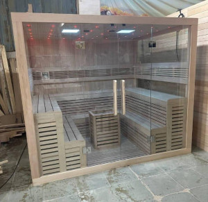 modern glass-fronted wooden sauna room designed for indoor or outdoor home use