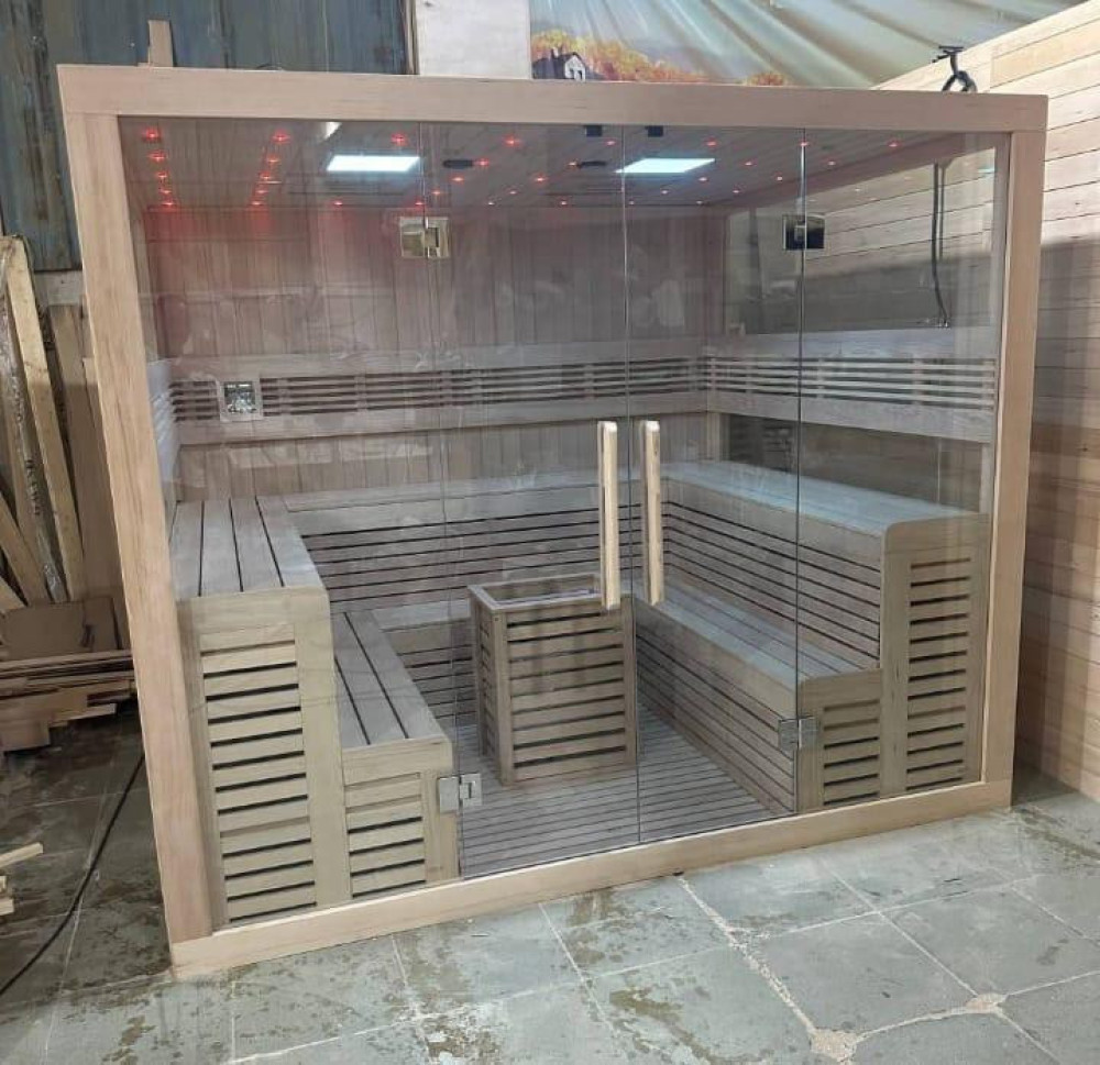 modern glass-fronted wooden sauna room designed for indoor or outdoor home use